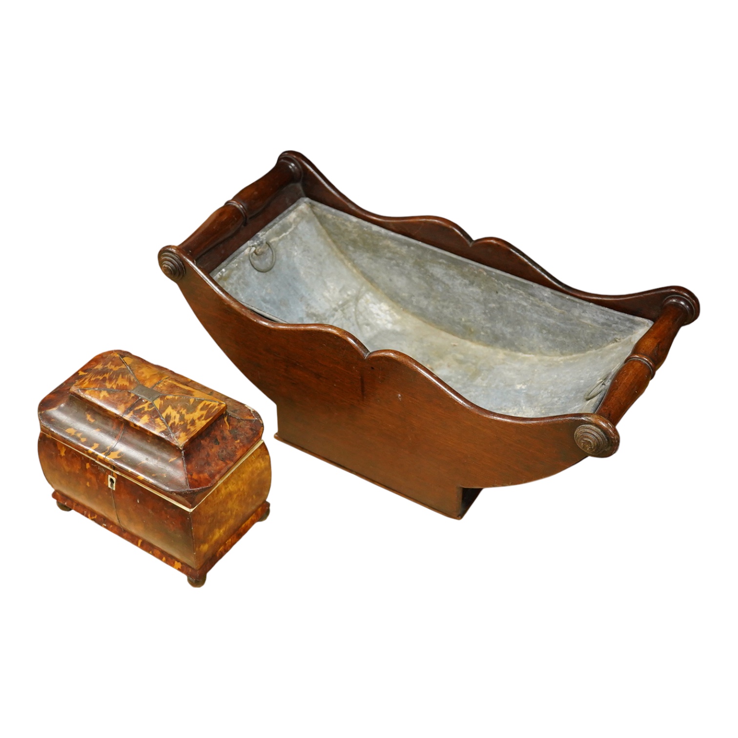 A Regency tortoiseshell tea caddy (damaged) and a mahogany cheese coaster, 43cm wide